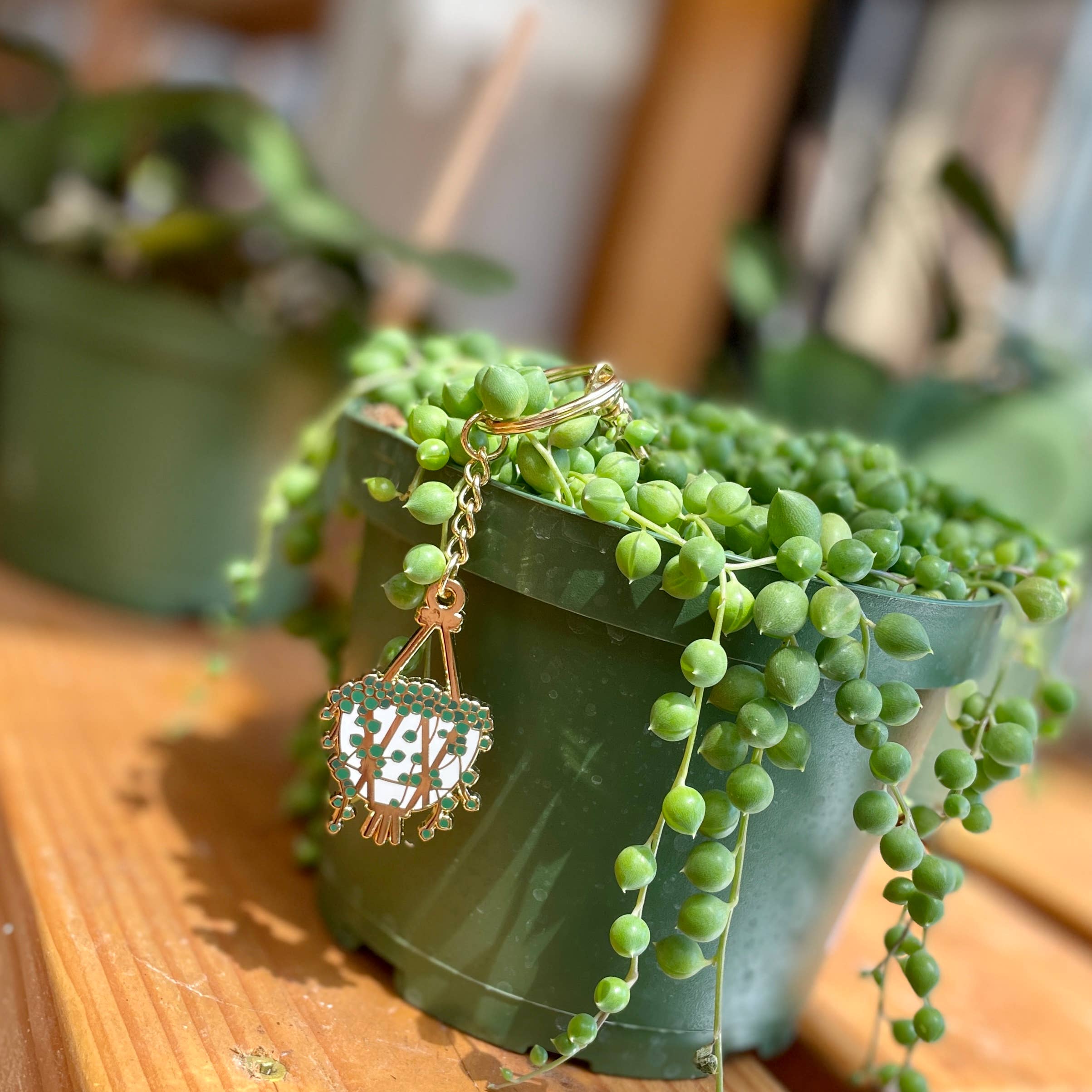 Gleaming String of Pearls Enamel Keychain