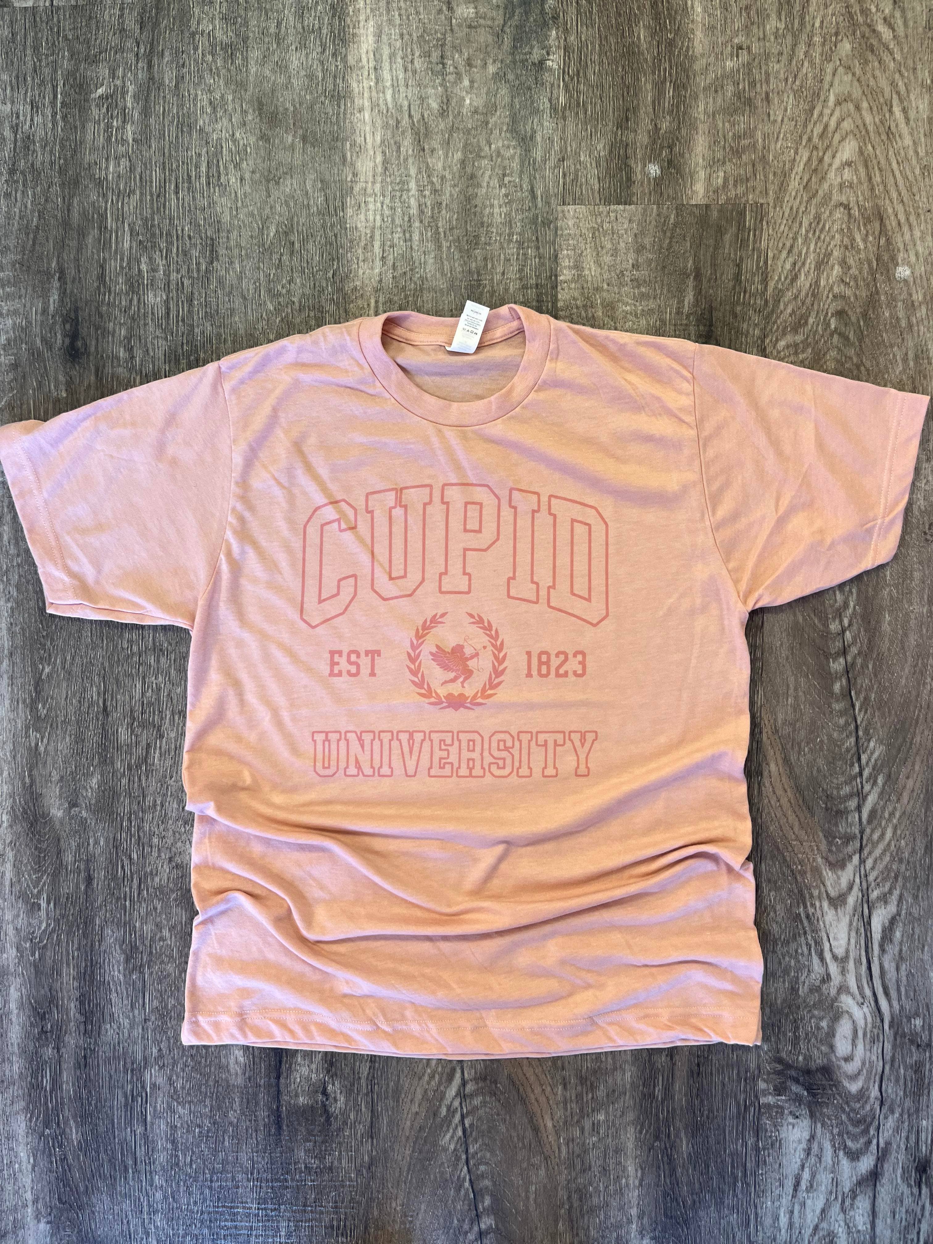 Cupid University Pink Print On Heather Peach Tee