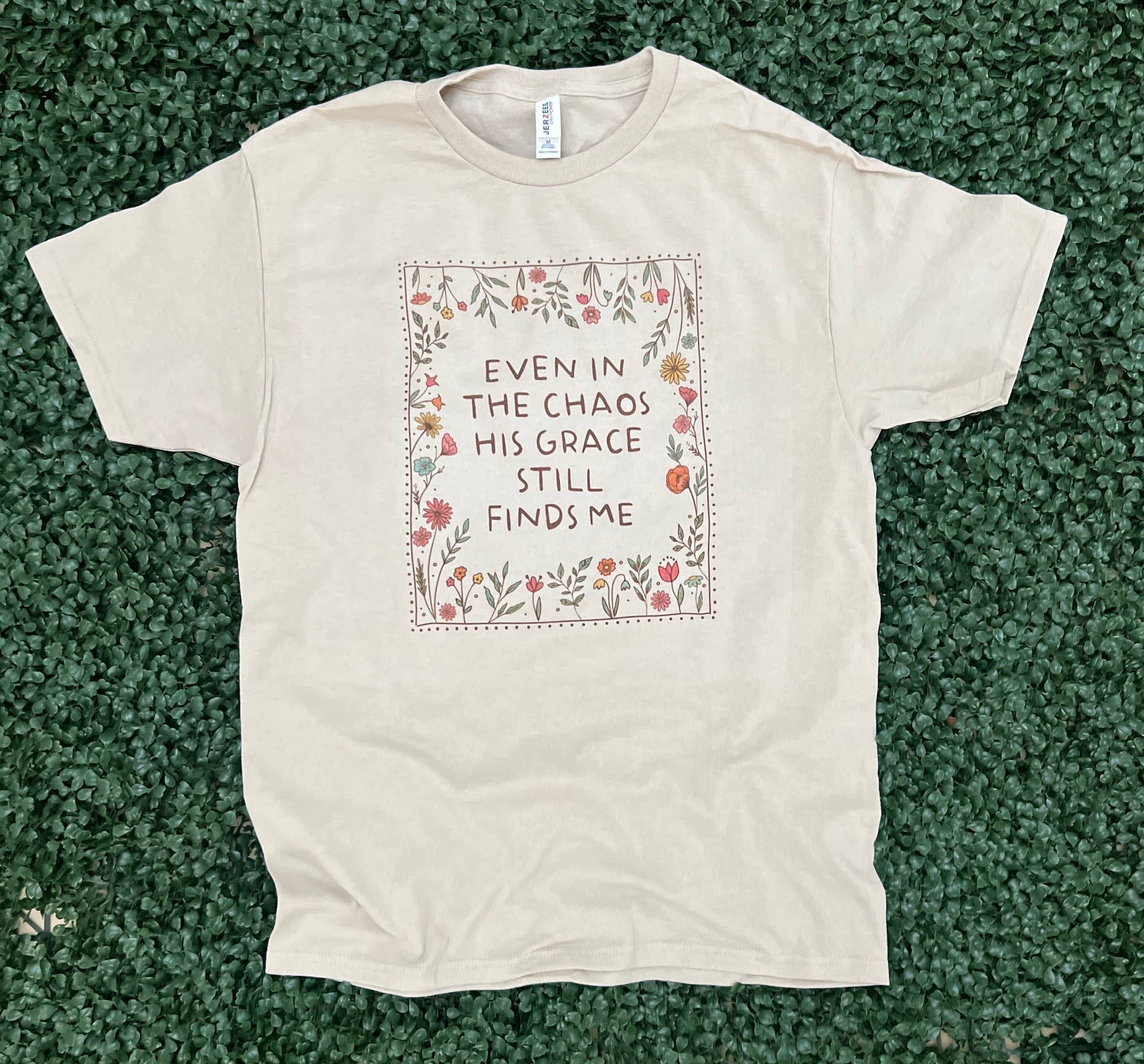 Even in the Chaos His Grace Still Finds Me On Sand Tee