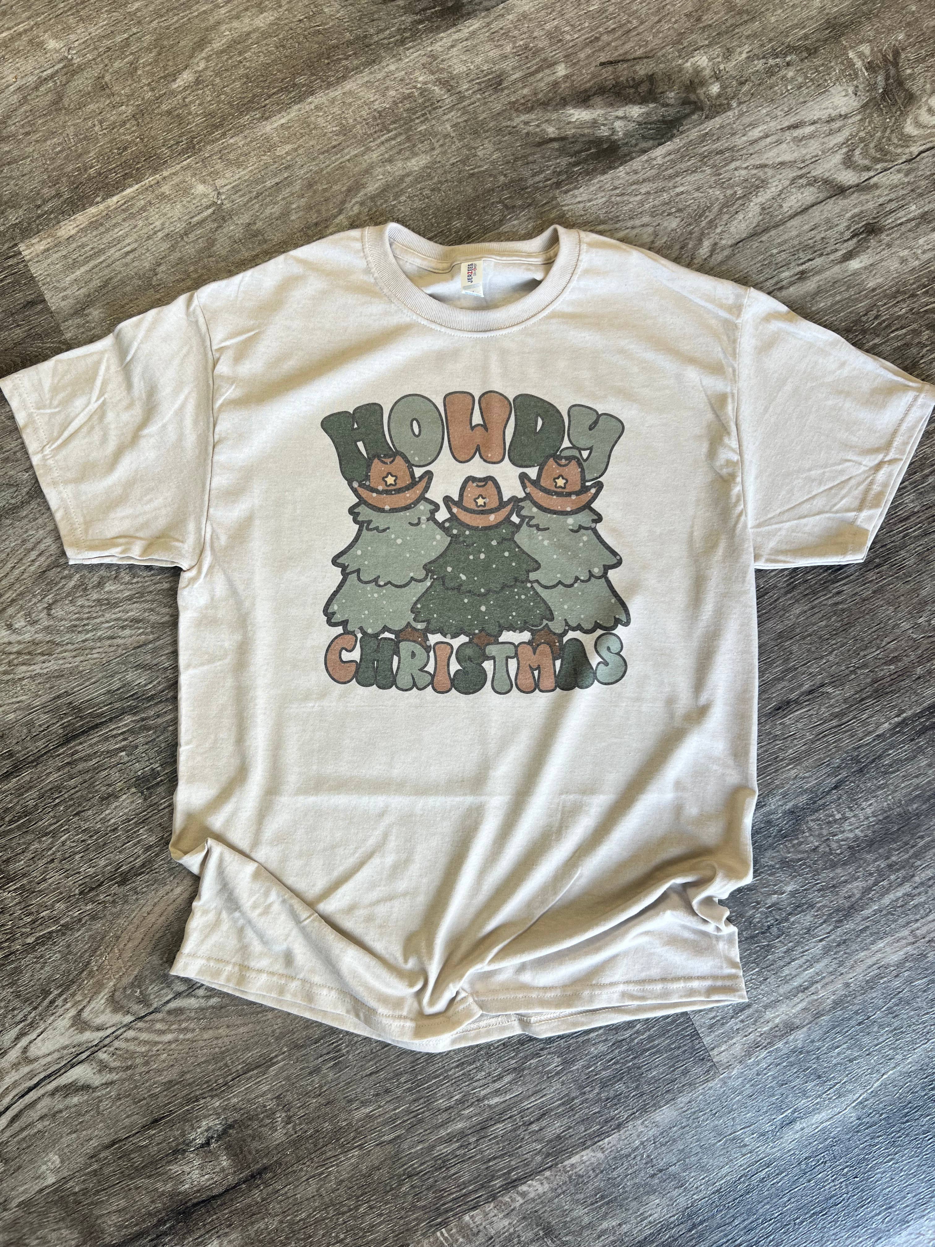 Howdy Christmas (Trees with Cowboy Hats) On Sand Tee