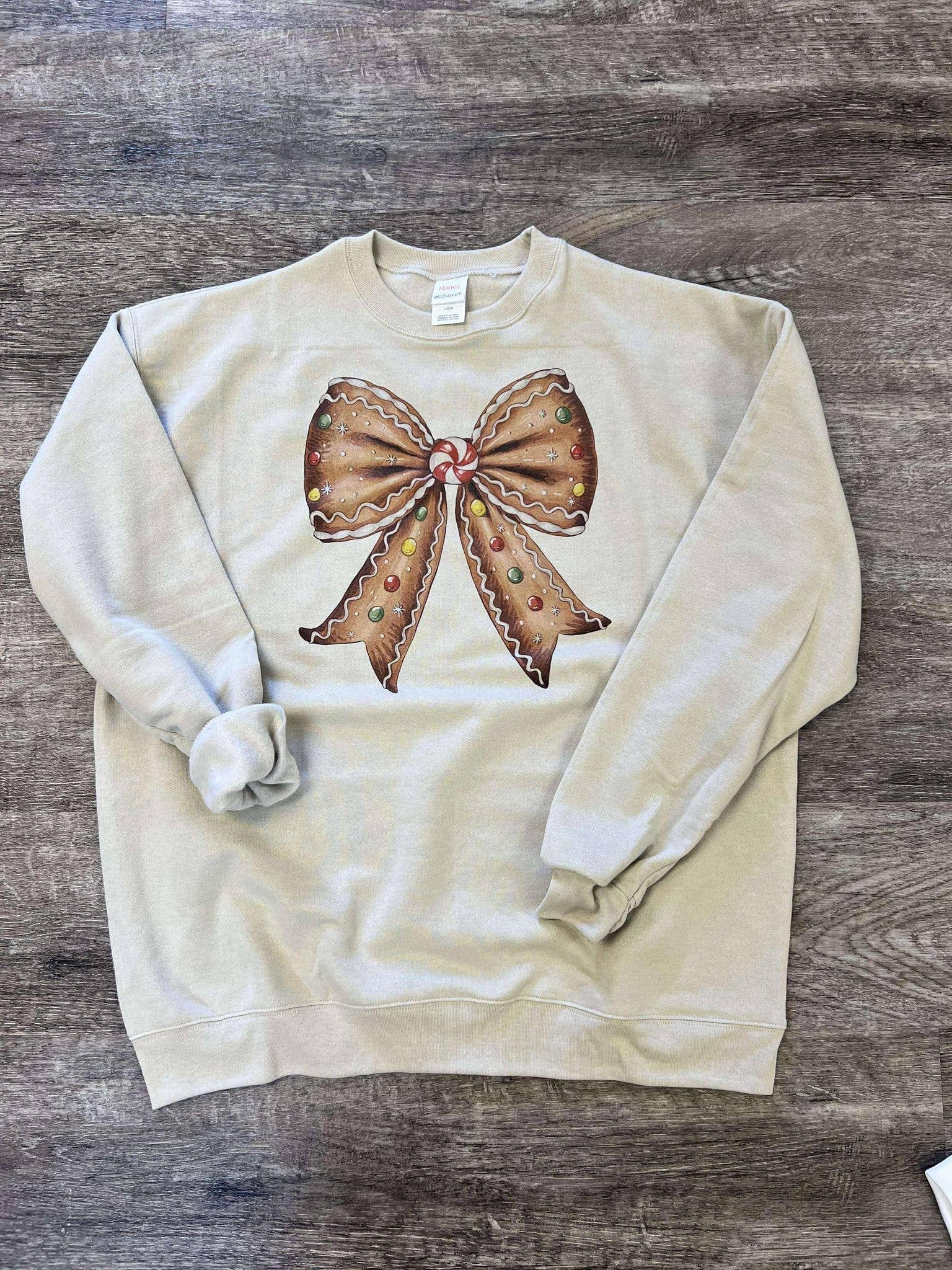 Gingerbread Christmas Bow On Sand Sweatshirt