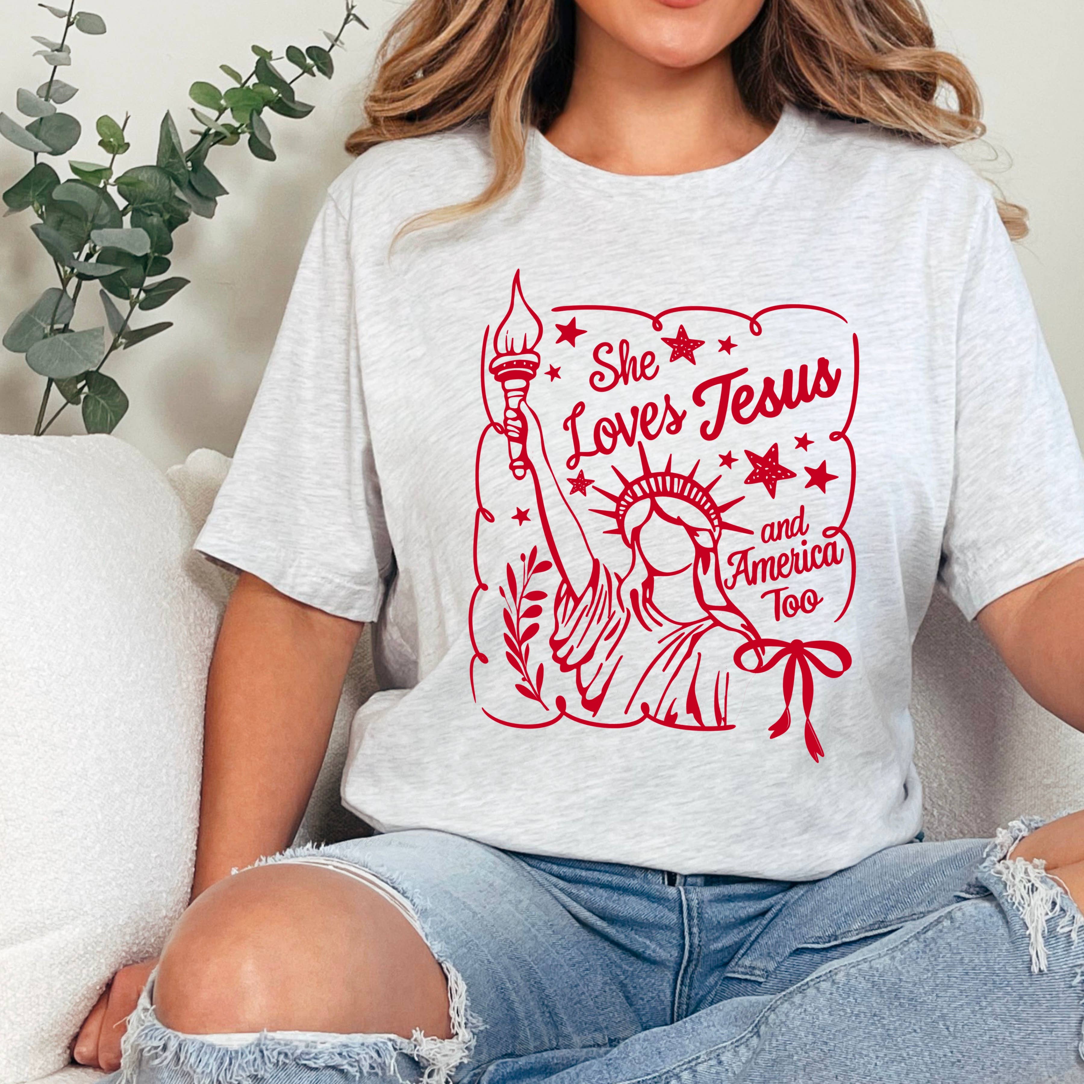 She Loves Jesus and America | July 4th Graphic Tee | Gildan