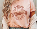 Warning the Girls Are Drinking Again - Funny T-Shirt