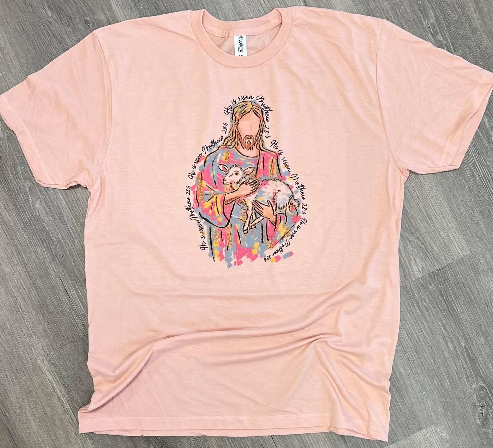 Brushstroke Jesus with Lamb He Is Risen On Peach Tee
