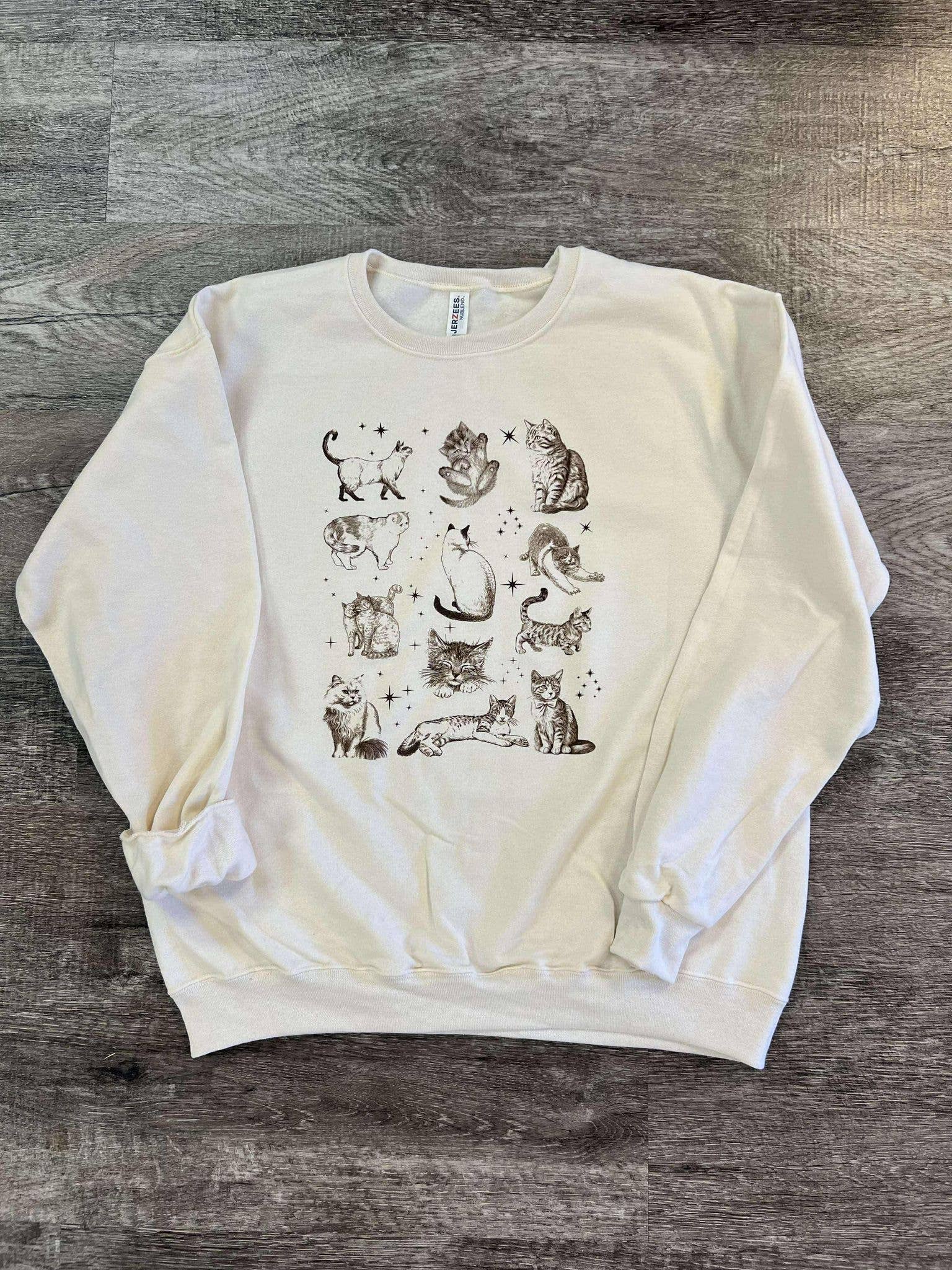 Magical Cat Collage On Cream Sweatshirt