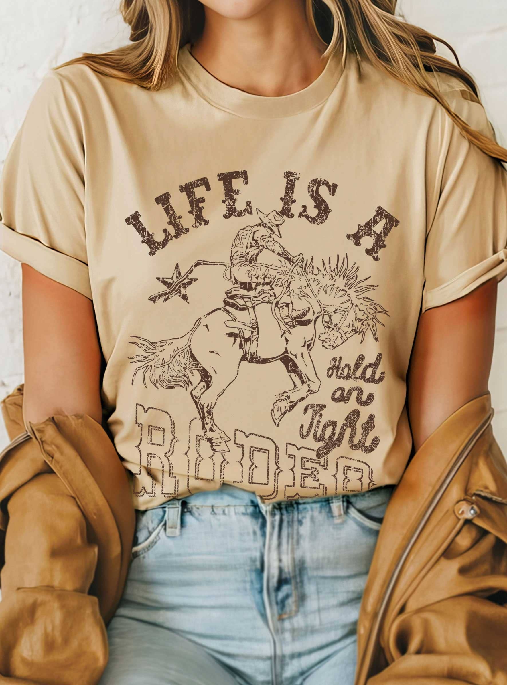 Life Is A Rodeo Cowboy Hold On Tight Graphic T-Shirts