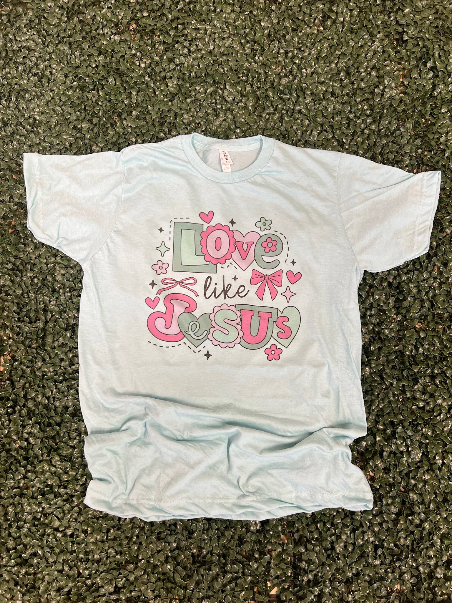 Love Like Jesus Pink and Green Hearts On Heather Purist Blue