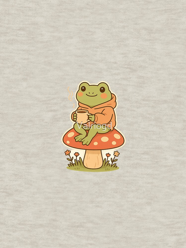 “Cozy Frog Drinking Coffee Cottagecore Mushroom Sticker” by Valriogd