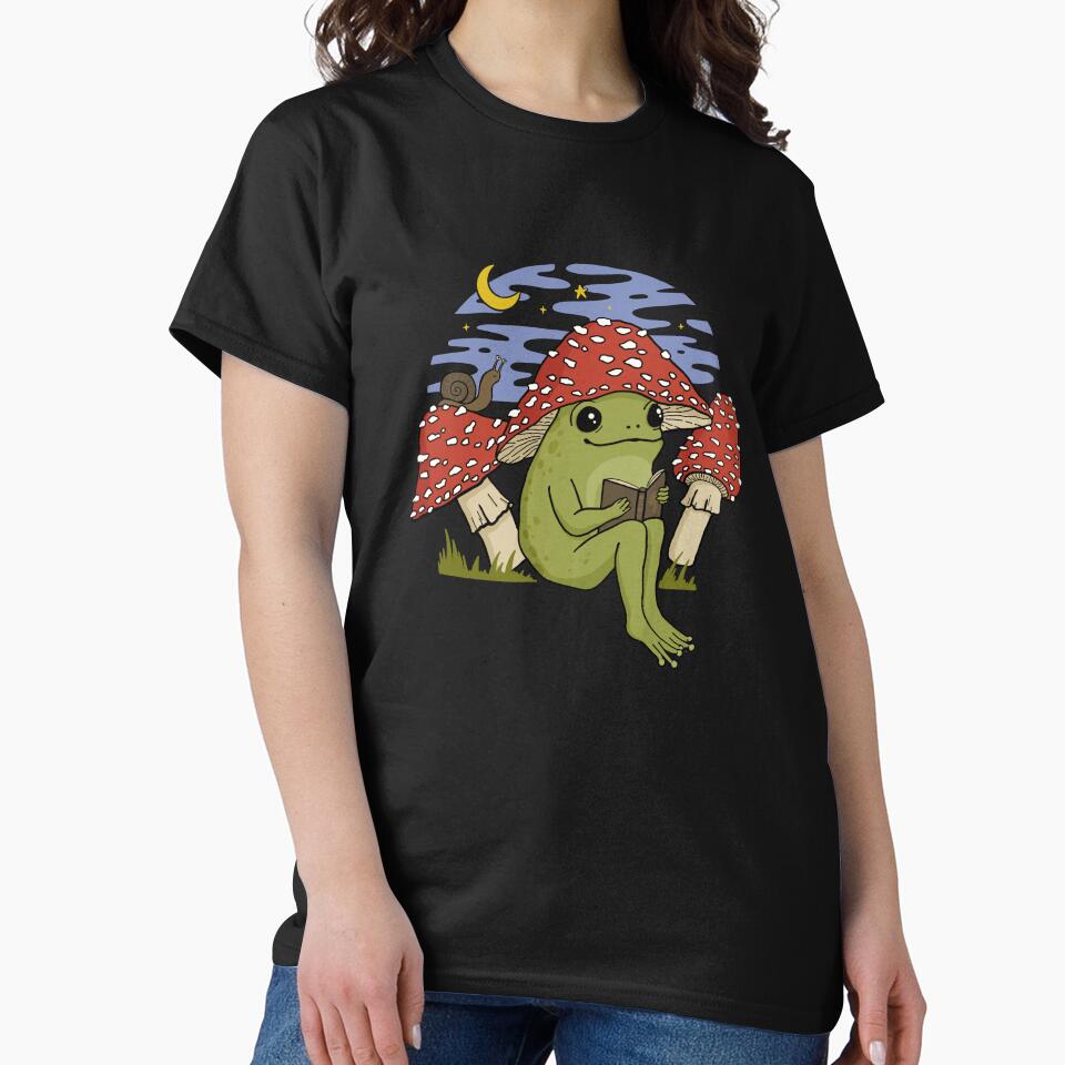 Cute Cottagecore Frog in Mushroom Hat Reading a Book: A Goblincore Toad Bookworm with Snail and Toadstool Features Enjoying a Night Sky in a Fairycore Psychedelic Vintage Setting by MinistryOfFrogs