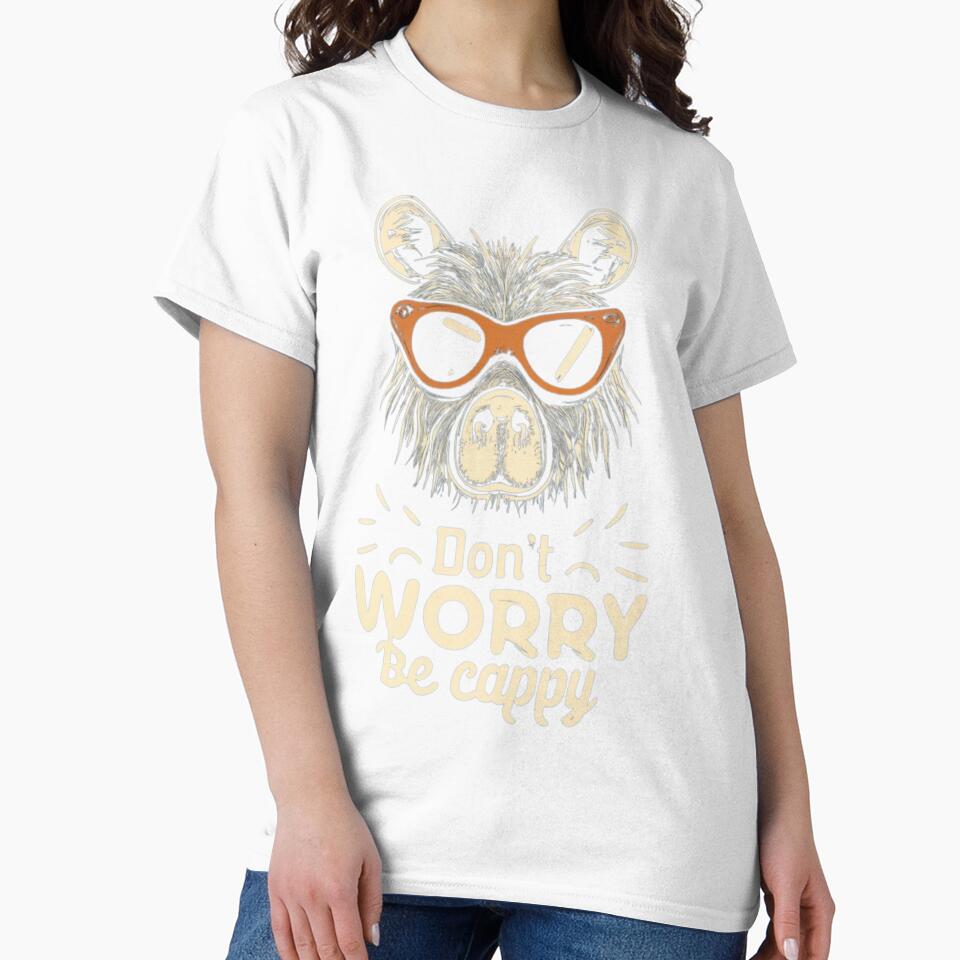 Capybara wearing sunglasses with 'don't worry be cappy' written in retro by BubusCollective